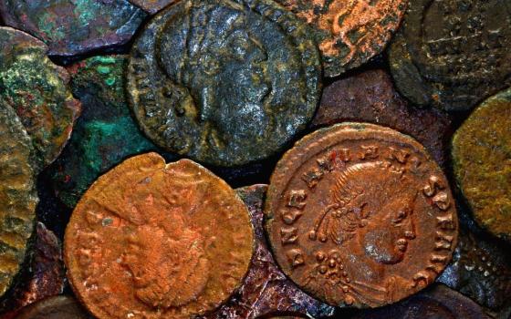a pile of ancient coins