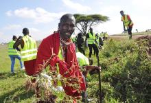 Amos Kwaite, a member of the Maasai community, joins Kenyans including members of the Laudato Si' Movement in a cleanup of Nairobi National Park June 4, 2022, as part of the observance of World Environment Day. (CNS/Fredrick Nzwili)