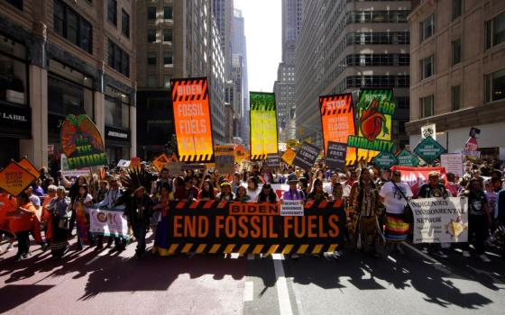 Activists mark the start of Climate Week in New York City Sept. 17, 2023, during a demonstration calling for the U.S. government to take action toward ending fossil fuel use in order to reduce the impact of global climate change. (OSV News Photo/Eduardo Munoz, Reuters)