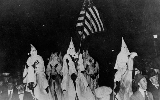 The Ku Klux Klan parades through the streets of Tulsa, Oklahoma, Sept. 21, 1923. (AP)