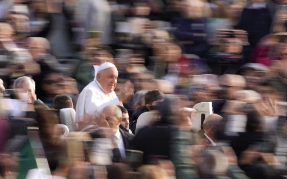 Pope Francis arrives for his weekly general audience in St. Peter's Square, at the Vatican, Wednesday, Nov. 22, 2023. (AP Photo/Andrew Medichini)