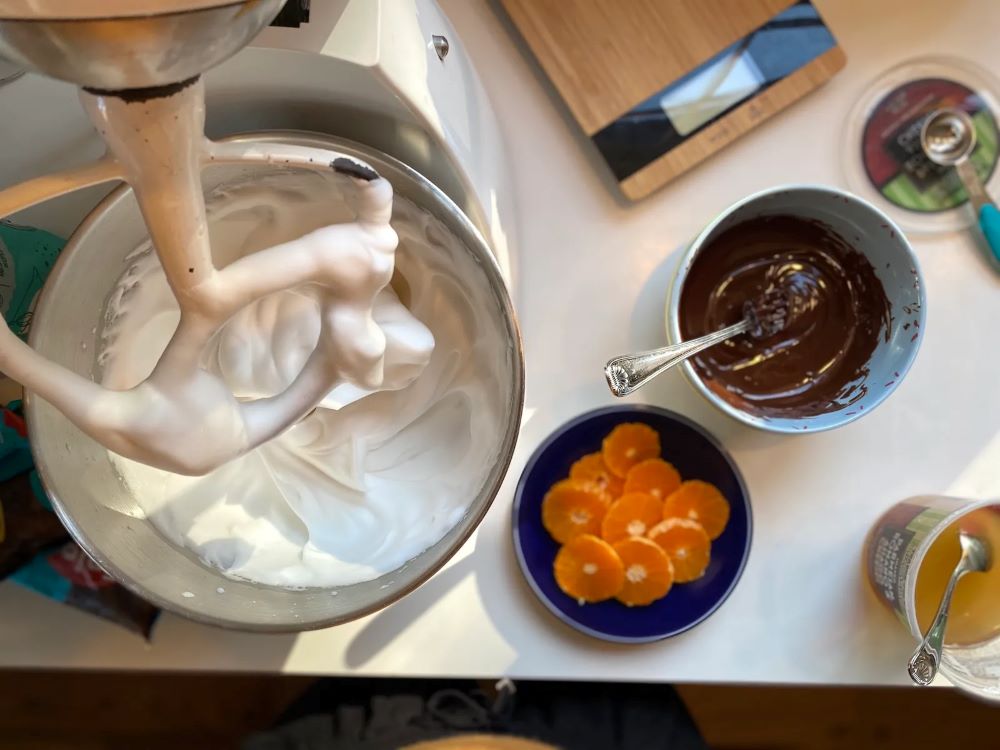 This meringue recipe from "Eating for Pleasure, People, and Planet" helps prevent food waste, and introduces readers to a plant-based substitute for egg whites. (Grist/Caroline Saunders)
