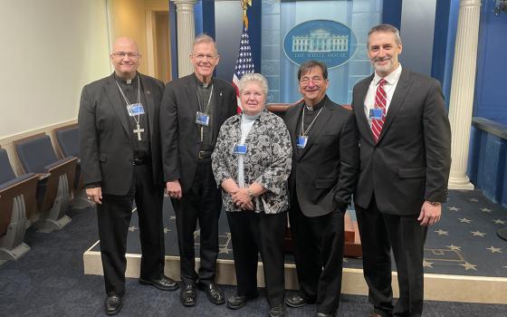 Bishop Edward Weisenburger (Diocese of Tucson, Arizona), Archbishop John Wester (Archdiocese of Santa Fe, New Mexico), St. Joseph Sr. Carol Zinn (executive director of the Leadership Conference of Women Religious), Bishop Joseph Tyson (Diocese of Yakima, Washington), and Franciscan Lonnie Ellis (executive director of In Solidarity) at the White House for a meeting about climate change on Nov. 17. (Courtesy of In Solidarity)