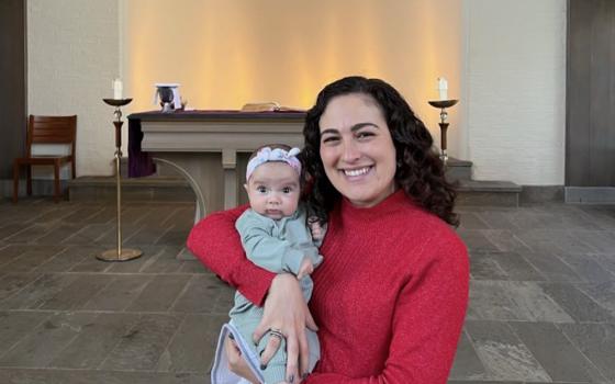 Contributor Nicole M. Perone and her baby are pictured at church. Perone describes her parish as "committed to being truly and holistically pro-life and pro-family." As she writes, "What should be a happy testimony is the reality that this experience is all too rare." (Courtesy of Nicole M. Perone)