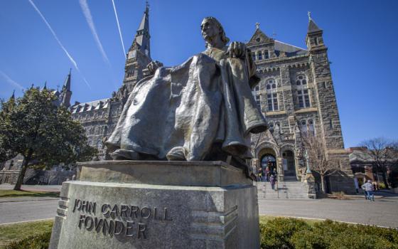 A statue of Baltimore Archbishop John Carroll — founder of Georgetown University — is seen on the Jesuit-run school's Washington campus March 3, 2022. (CNS/Chaz Muth)